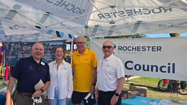 Shaun Palmer with City Council members and community members at a Rochester Safe City Nights event