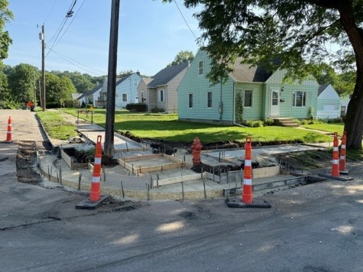 New sidewalk construction with safety cones on a Ward 5 residential street in Rochester Minnesota