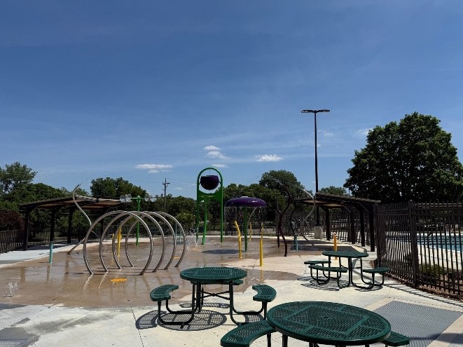 New splash pad with spray hoops and picnic tables at Silver Lake Park in Rochester Minnesota