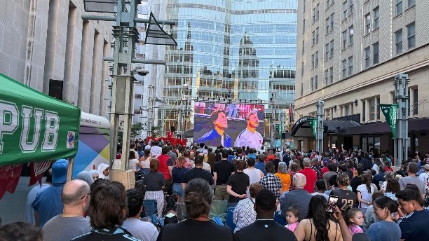 Crowd of soccer fans at a downtown Rochester World Cup watch party