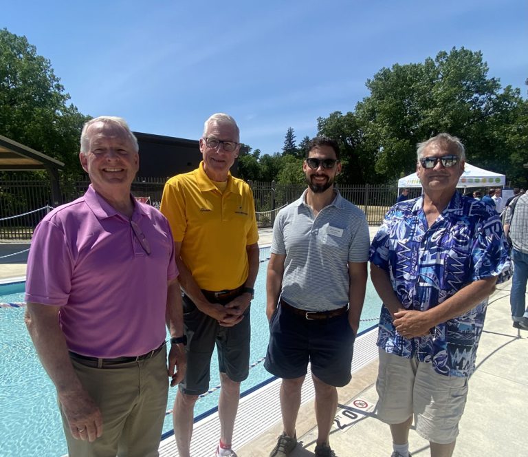 Shaun Palmer with fellow Rochester City Council members at Silver Lake Pool